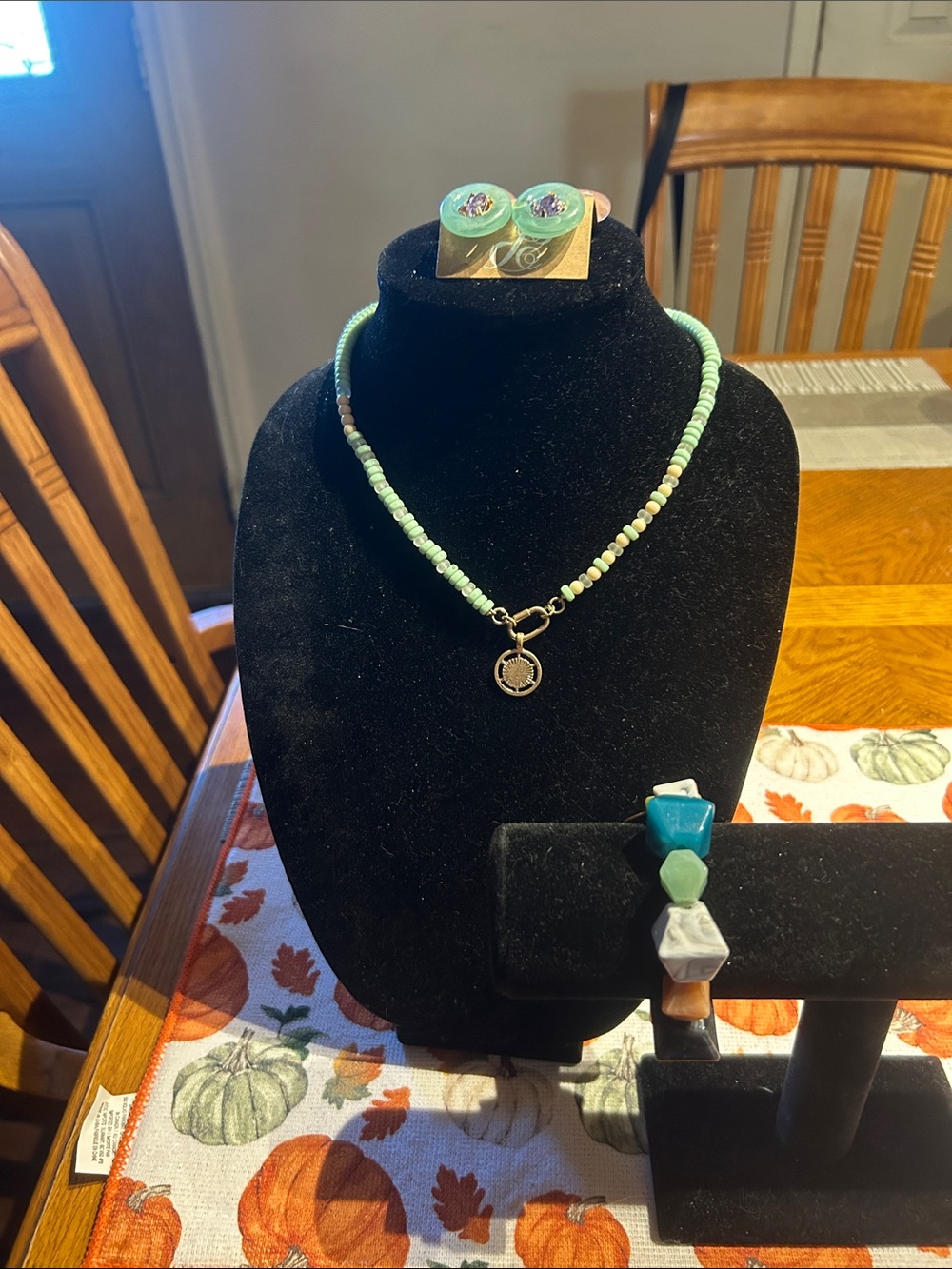 Handcrafted Mint Green Beaded Necklace with Charm, earrings and bracelet.